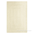 Tapis tressé en laine naturelle de couleur beige d&#39;ivoire blanc